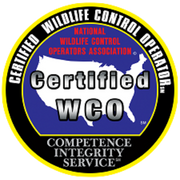 Certified Wildlife Control Operator badge from the National Wildlife Control Operators Association, featuring the text "Certified WCO" and emphasizing competence and integrity in wildlife pest control services.